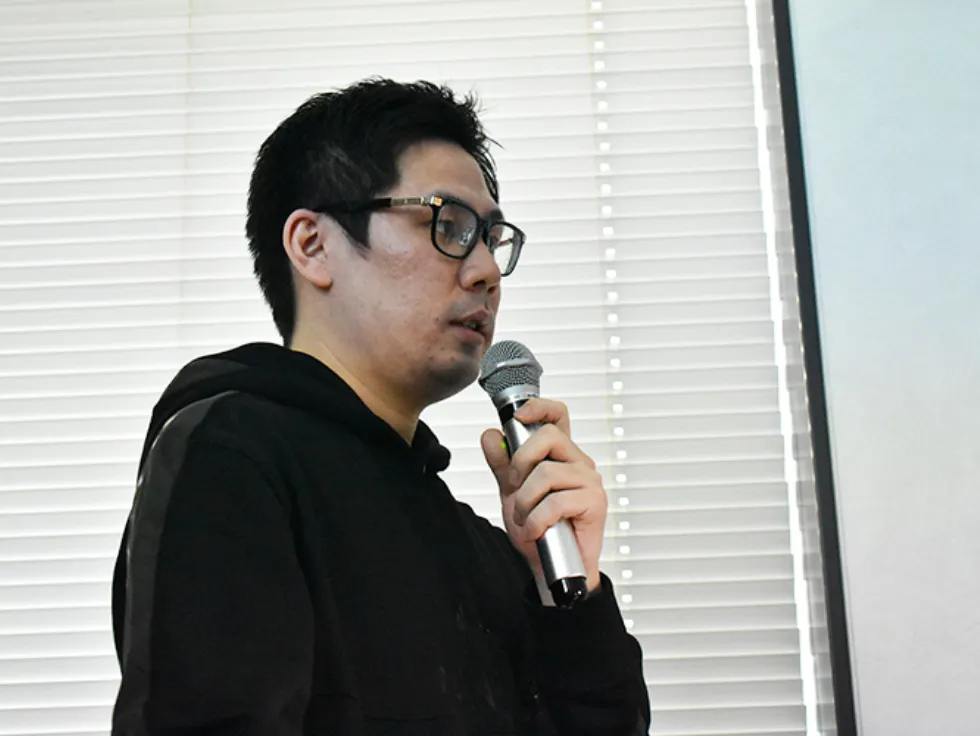 登壇する笠岡 亮介